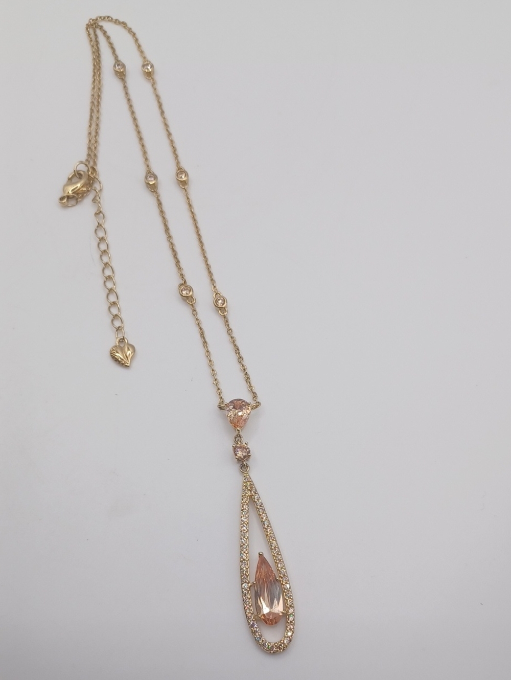 Carolee Rose Gold Tone and Peach Colored Rhinestone Necklace